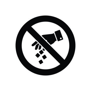 A black and white prohibition sign depicts a hand dropping objects indicating a do not litter message