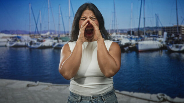 Woman cupping hands to mouth while shouting toward moored boats at a street pier, alternating yawns and pouts across frames; frustration.