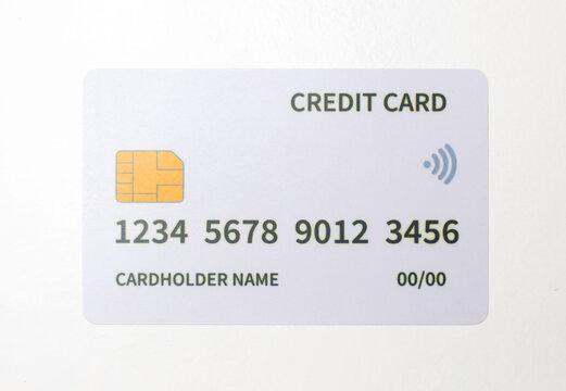 Close-up image of a white debit card on a white background for design purposes.