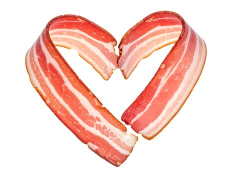 Sliced strips of pork belly arranged to form a heart shape against a stark white backdrop, showcasing the layers