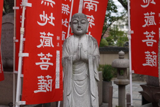 Golden Jizo Statue At Temple Entrance