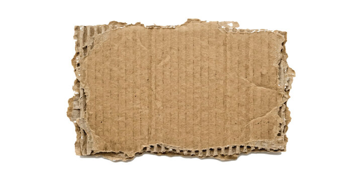 Rectangular piece of brown corrugated cardboard with rough torn edges isolated on a white background showing internal fluted paper texture