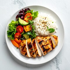 Healthy mixed food plate with rice chicken and vegetables
