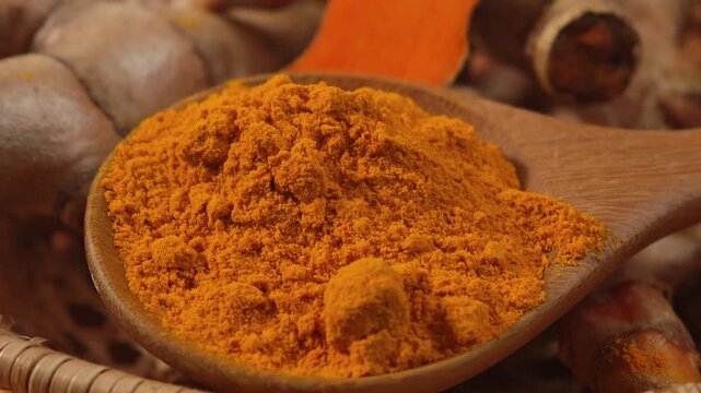 Turmeric powder on a spoon.