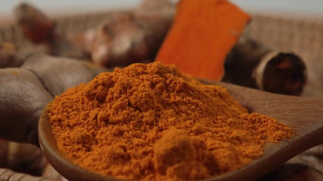 Turmeric powder on a spoon.