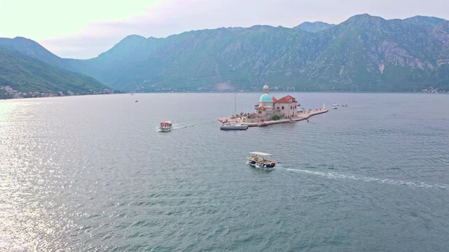 Aerial view landscape with islands of the Bay of Kotor - Boka Bay. Our Lady of the Rocks (Gospa od Skrpjela) church and Saint George Benedictine (Sveti Djordje) monastery, Montenegro