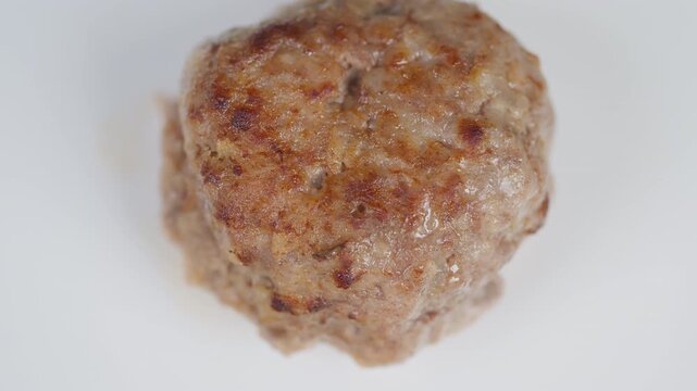 Delicious homemade cutlet with crispy exterior and juicy interior added. Rustic style dish showcasing perfectly seared cutlet with tender meat and flavorful juices