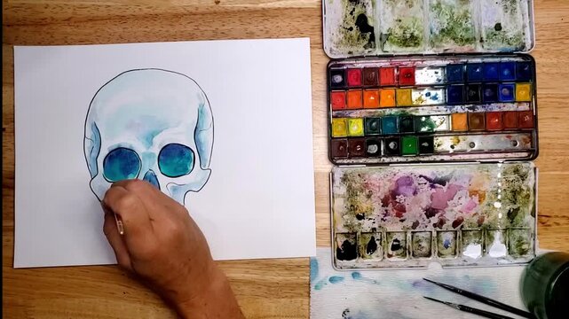 Watercolor Skull with no mandible Painting Timelapse Blue Tones Overhead