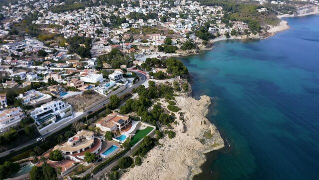 Aerial view of the chalets and villa in the coastline of Albir beach, in the Mediterranean Spanish province of Alicante.