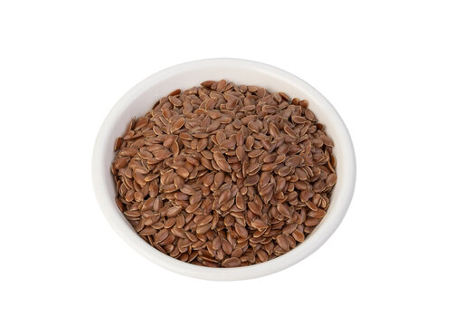 flax seeds in white bowl isolated on white background with Clipping Path.