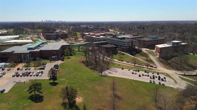 Aerial view of Saint Louis University campus with buildings and walkways in spring