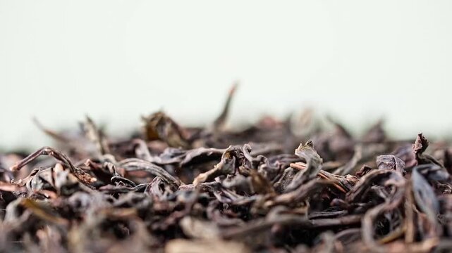 Macro Close-up of Premium Dried Black Tea Leaves and Oolong Puer Detail for Traditional Culture Food Advertising