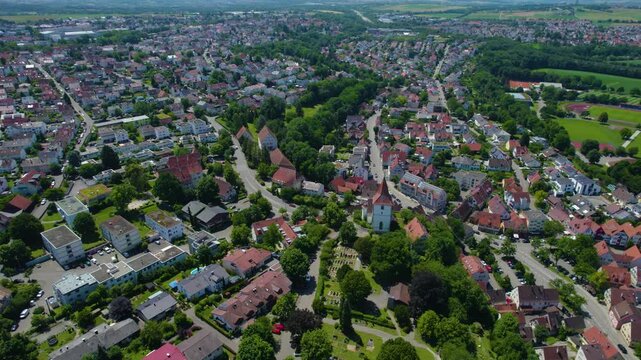 Aerial view around the city Freiberg am Neckar in Germany. On cloudy day in spring beside the river Neckar