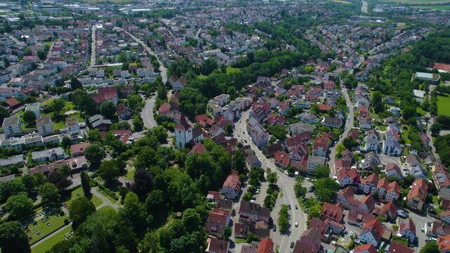 Aerial view around the city Freiberg am Neckar in Germany. On cloudy day in spring beside the river Neckar