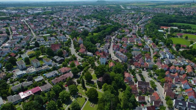 Aerial view around the city Freiberg am Neckar in Germany. On cloudy day in spring beside the river Neckar