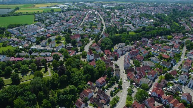 Aerial view around the city Freiberg am Neckar in Germany. On cloudy day in spring beside the river Neckar