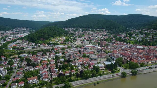 Aerial panorama view of the city Eberbach in Germany on a cloudy day in spring beside the Neckar river
