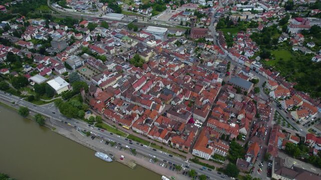 Aerial panorama view of the city Eberbach in Germany on a cloudy day in spring beside the Neckar river