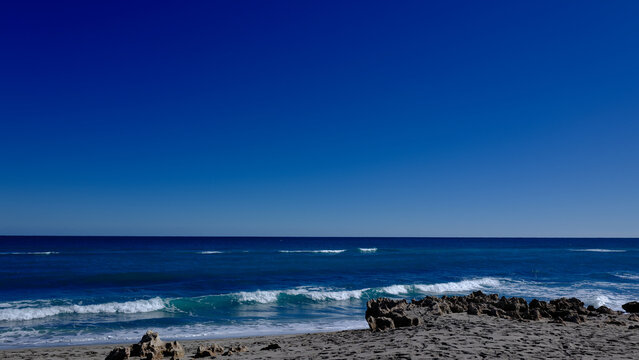 The coral rocky coast off Jupiter Island Beach in Florida