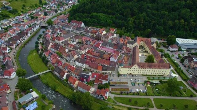  Aerial view of the old town city Wolfach in south Germany in the black forest . On a sunny day in Spring. 