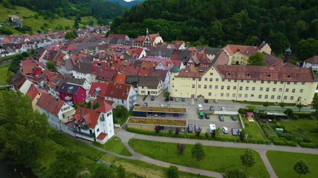  Aerial view of the old town city Wolfach in south Germany in the black forest . On a sunny day in Spring. 