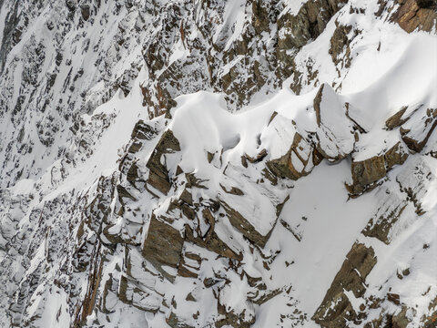 Snow-Covered Rocky Mountain Cliffs in British Columbia, Canada &mdash; Alpine Winter Landscape and Remote Wilderness
