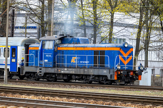 Warsaw, Poland - April 04, 2026: A blue PKP Intercity SM42 diesel locomotive performing shunting operations at the Grochow maintenance depot