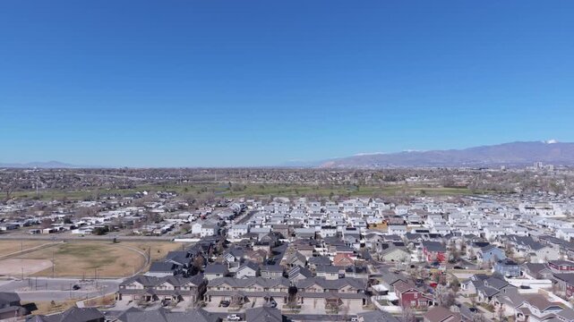 Aerial view of suburban residential houses in Midvale, Utah, USA.