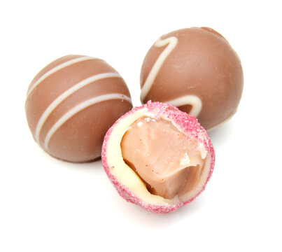 Chocolate candies collection. Beautiful Belgian truffles isolated on white background