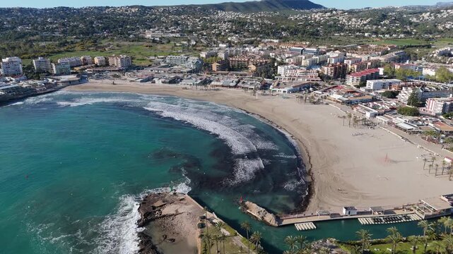Drone flying over javea beach and coastline in alicante