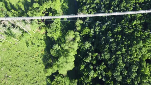 Aerial Top Down View of Geierlay Suspension Bridge Entry over Forest, Germany