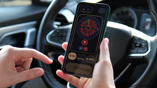 Close-up of man playing mobile roulette game on smartphone inside a car. Pressing spin button on high-quality gambling app interface. Perfect for iGaming reviews, app marketing, and digital betting