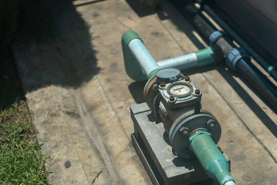 Water Flow Meter on Green Pipe System