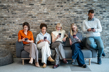 Fototapeta premium Group of diverse people using smartphones social media