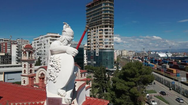 Symbolic maritime goddess sculpture on the facade of the former National Bank, Durres, Albania.