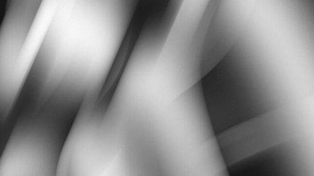 Abstract monochromatic background with flowing light motion. Blur texture created by lens movement. Artistic pattern of grey gradients for modern graphic design.