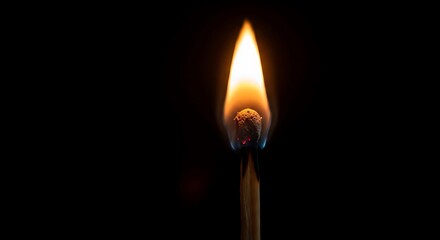 Burning matchstick flame on black background, close-up shot, 4k © LuminaMotion Assets