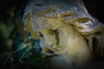 Fototapeta premium Angel with tear on face, representing sadness, empathy, and emotional depth in a symbolic and psychological concept.