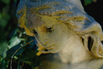 Fototapeta premium Crying angel statue symbolizing that even guardians feel pain, expressing deep emotion, vulnerability, and silent sorrow in a dramatic composition.