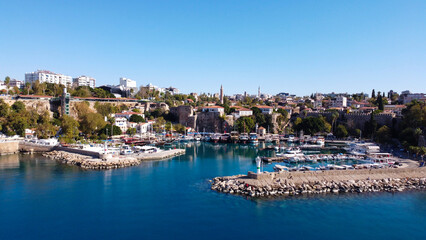 Obraz premium Aerial High Angle View of Historic Kaleici Old Harbor with Yachts and Lighthouse in Antalya Turkey