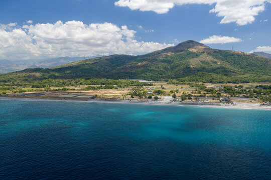 Scenic Panorama Aerial Drone Picture of the crystal clear water and the beach and Mount Katung-uhan in Botolan, Zambales in the Philippines 