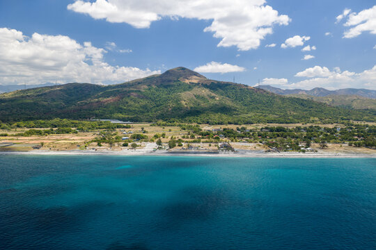 Scenic Panorama Aerial Drone Picture of the crystal clear water and the beach and Mount Katung-uhan in Botolan, Zambales in the Philippines 