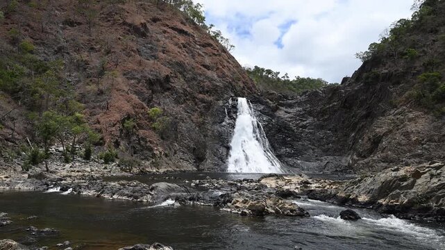Beautiful Wujal Wujal Falls along the bloomfield road towards Cape tribulation through the Daintree Rainforest in tropical north queensland, a popular travel destination in Australia.