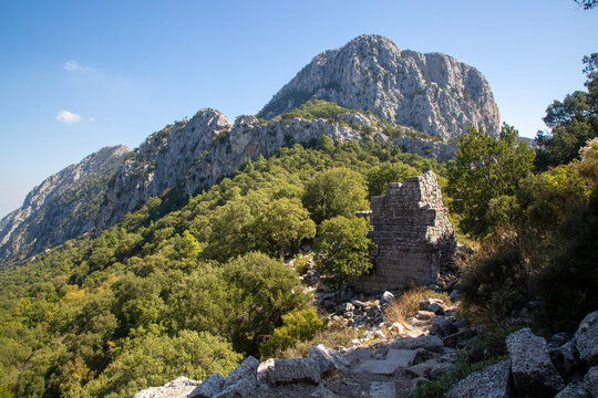 Ancient Ruins of Termessos Antique City with Steep Cliffs and Forest in G&uuml;ll&uuml;k Mountain National Park Antalya Turkey