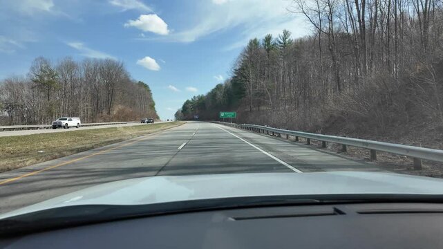 Driving Through Appalachian Foothills in Springtime With Clear Skies