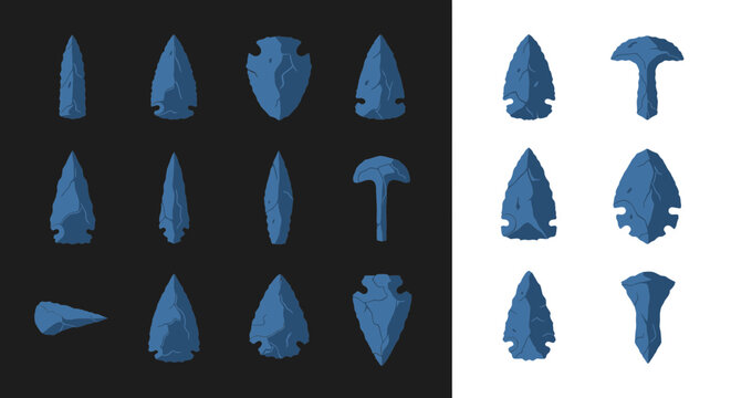 Collection of ancient stone arrowheads and prehistoric tools, isolated on white and dark backgrounds.