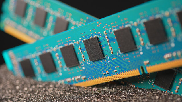 RAM memory sticks module macro view, computer hardware. RAM shortage and prices increase due AI boom high demand concept. AI data center and server manufacturing is consuming immense amounts of memory