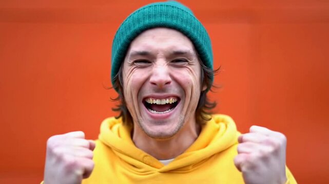 Happy man celebrating success and victory