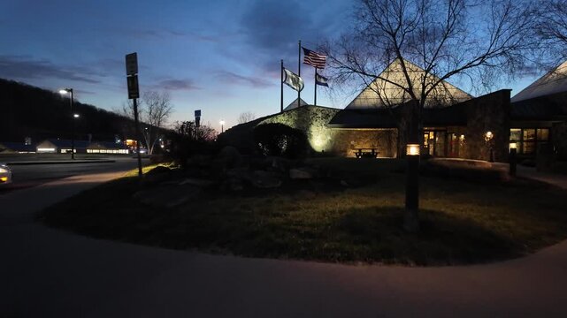 Walking Towards West Virginia Rest Stop Entrance at Night