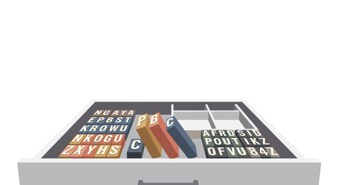 Typography letters in open drawer with books and empty compartments